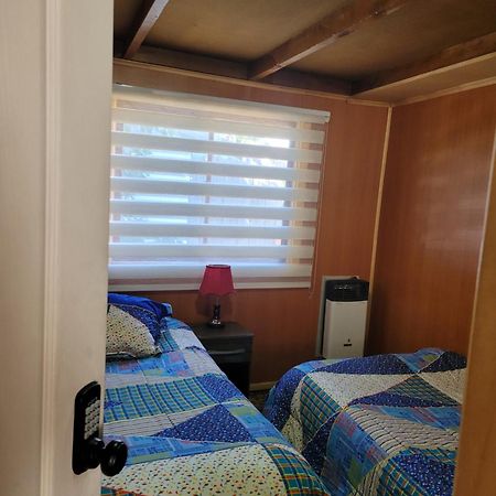 Hostal Traveltour El Campesino Пуерто Наталес Екстериор снимка