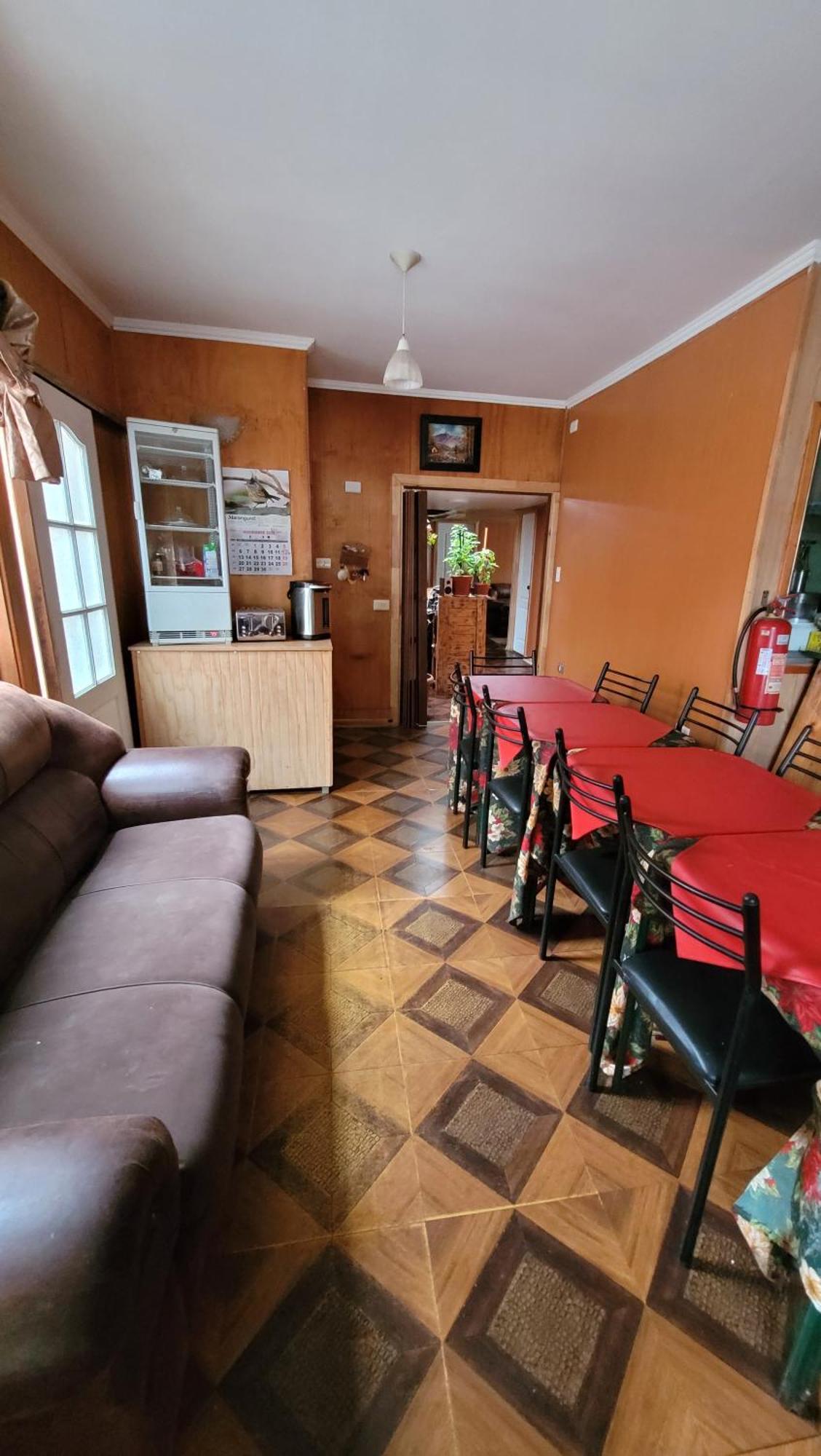 Hostal Traveltour El Campesino Пуерто Наталес Екстериор снимка
