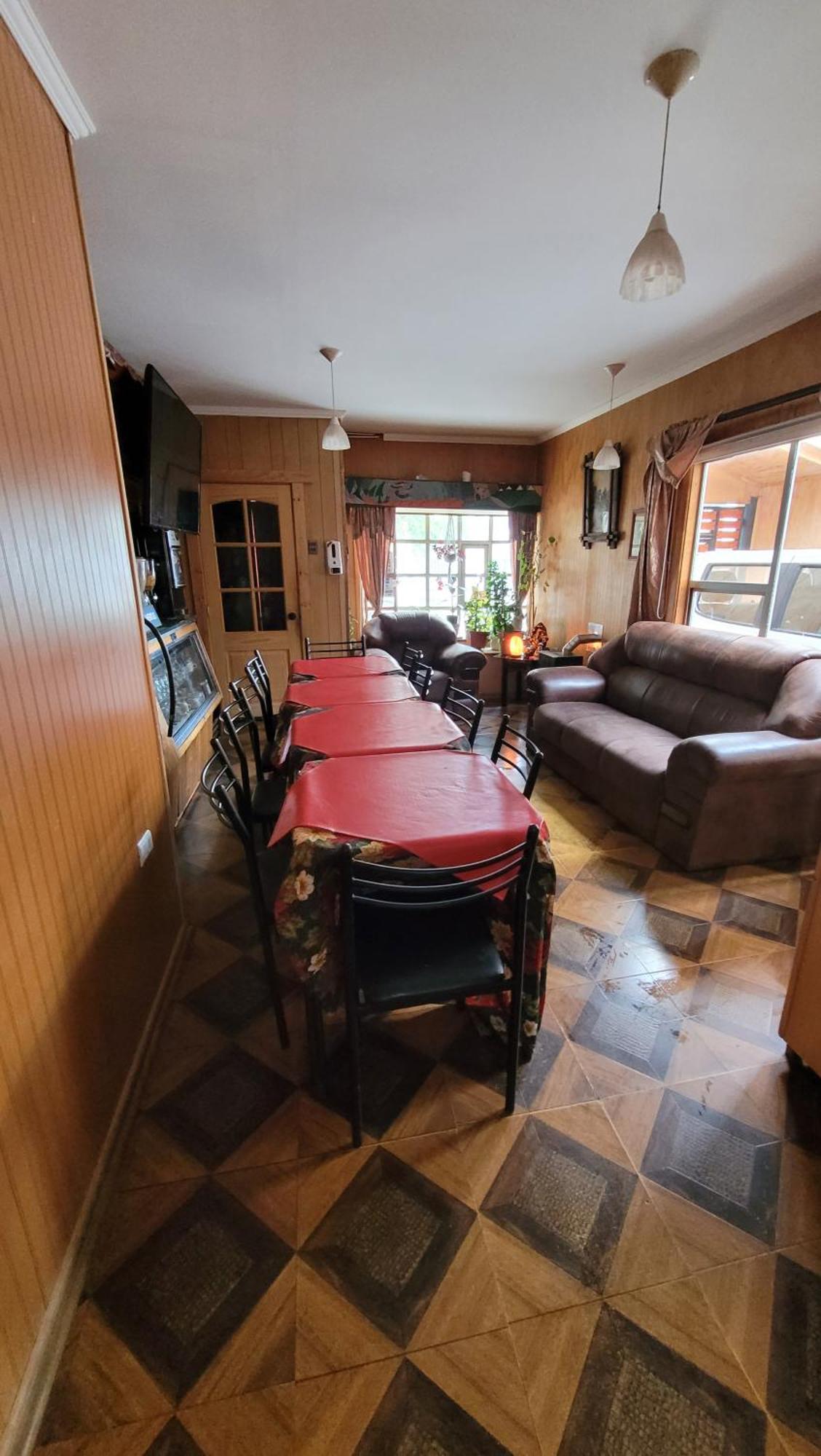 Hostal Traveltour El Campesino Пуерто Наталес Екстериор снимка