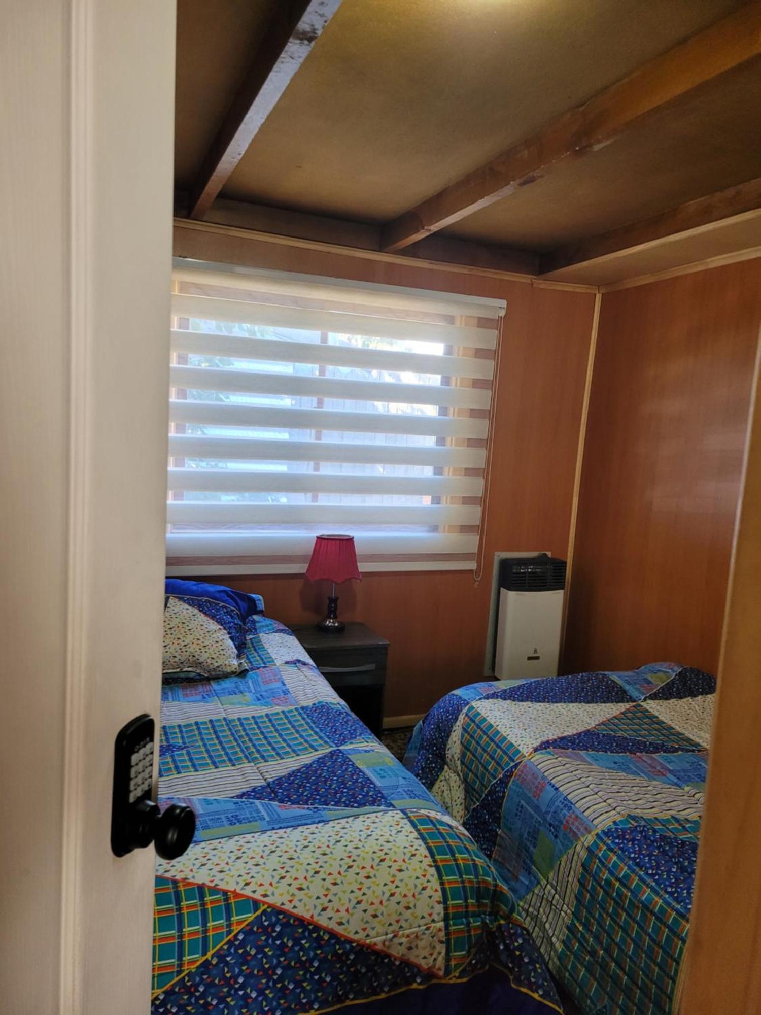 Hostal Traveltour El Campesino Пуерто Наталес Екстериор снимка