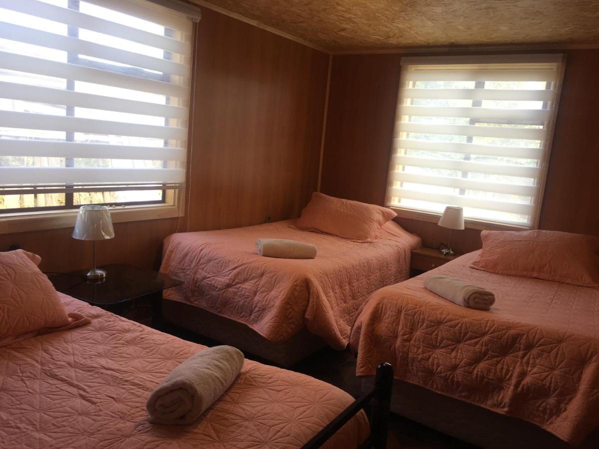Hostal Traveltour El Campesino Пуерто Наталес Екстериор снимка